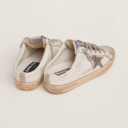 Super-Star Sabot with a platinum glitter star and suede tongue