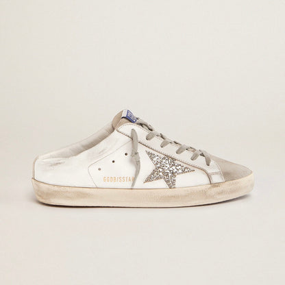 Super-Star Sabot with a platinum glitter star and suede tongue