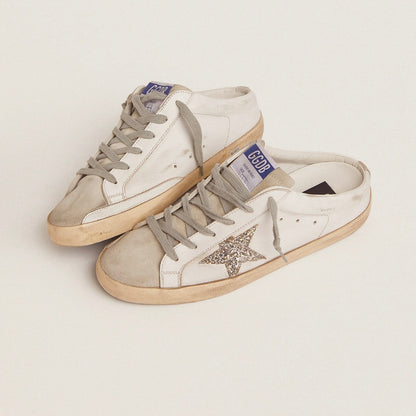 Super-Star Sabot with a platinum glitter star and suede tongue